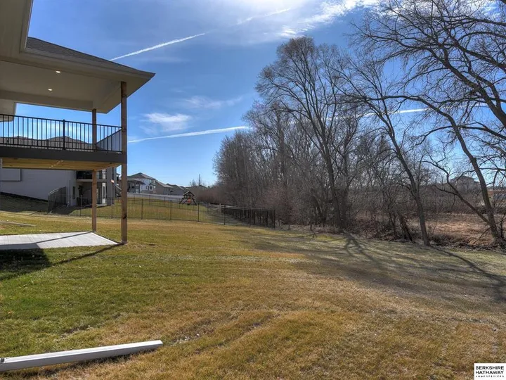 Backyard and deck overlooking trees