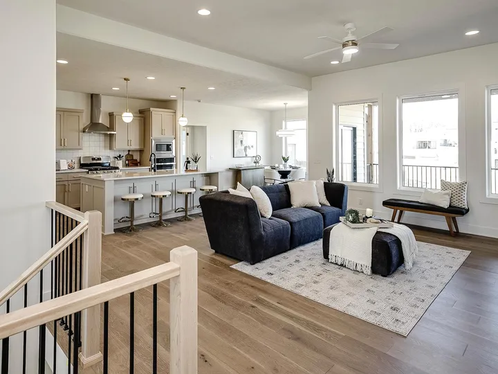 Open-concept living room with staircase